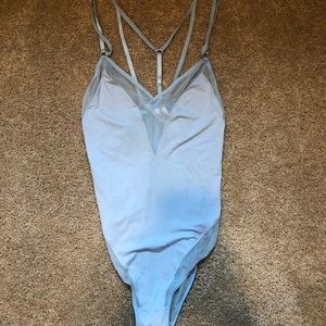 bodysuit with mesh detail and cross back